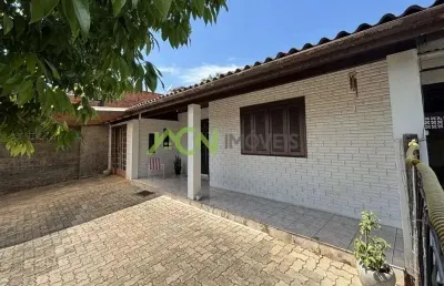 Terreno com 452,40 m² no bairro floresta, com 2 casas