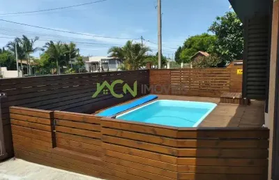 Casa com dois dormitórios sendo um suite em nova tramandai!!!!