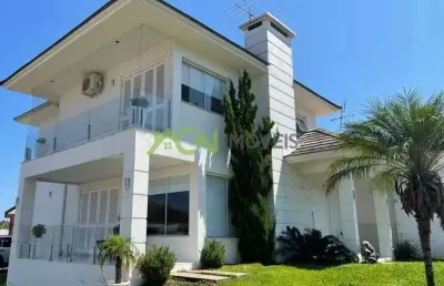 Casa com 3 dormitórios (1 suíte com closet), salão de festas, amplo pátio e acesso para 2 ruas. bairro sol nascente, em estância velha.
