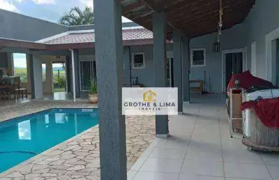 Casa térrea com 4 dormitórios, 4 suítes à venda, 338 m² - condomínio lago dourado