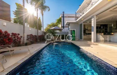 Sobrado à venda em campinas, loteamento parque dos alecrins, com 4 suítes, com 356 m²
