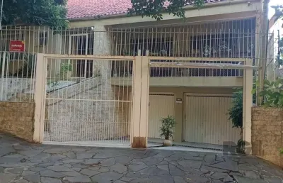 Casa com 3 quartos à venda na rua fagundes varela, santo antônio, porto alegre, 420 m2 por r$ 1.250.000
