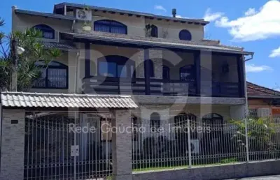 Casa com 6 quartos à venda na Rua Paissandu, Partenon, Porto Alegre
