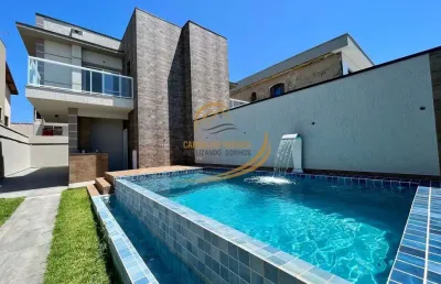 Maravilhosa casa sobreposta térrea com piscina e churrasqueira frente mar em itanhaém!