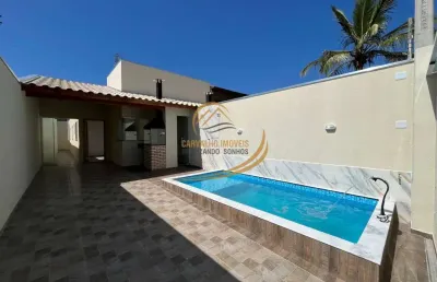 Linda casa geminada lado pista 600 metros do mar com piscina e churrasqueira em itanhaém!