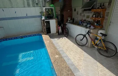 Linda casa localizada na vila caiçara 90 metros do mar em praia grande -sp