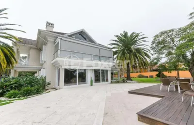 Casa em condomínio fechado com 7 quartos à venda na avenida juca batista, 8000, belém novo, porto alegre, 940 m2 por r$ 6.950.000