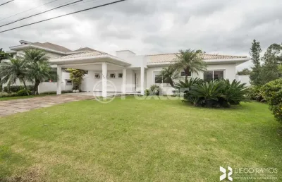 Casa em condomínio fechado com 3 quartos à venda na avenida juca batista, 8000, belém novo, porto alegre, 253 m2 por r$ 2.690.000