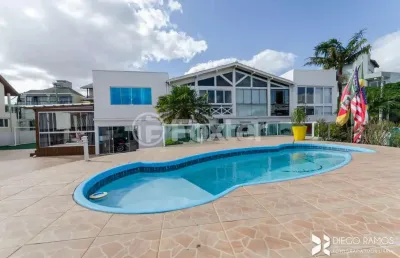 Casa em condomínio fechado com 5 quartos à venda na rua alcebíades antônio dos santos, 356, nonoai, porto alegre, 627 m2 por r$ 2.536.500