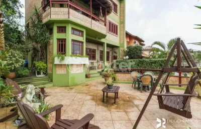 Casa com 3 quartos à venda na rua imeram teixeira cabeleira, 25, ipanema, porto alegre, 267 m2 por r$ 1.050.000