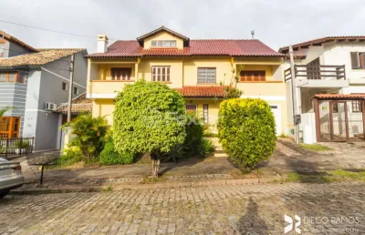 Casa com 3 quartos à venda na rua kyve t. knijnik, 20, espírito santo, porto alegre, 321 m2 por r$ 750.000