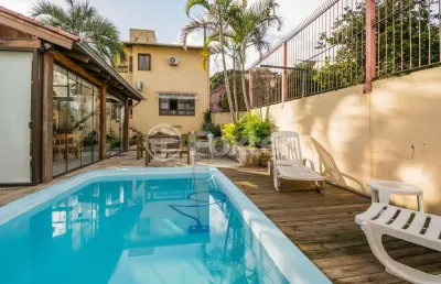 Casa com 3 quartos à venda na rua banco do comércio, 354, santa tereza, porto alegre, 279 m2 por r$ 1.100.000