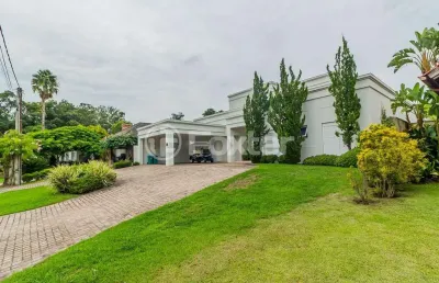 Casa em condomínio fechado com 4 quartos à venda na avenida juca batista, 8000, belém novo, porto alegre, 550 m2 por r$ 5.250.000