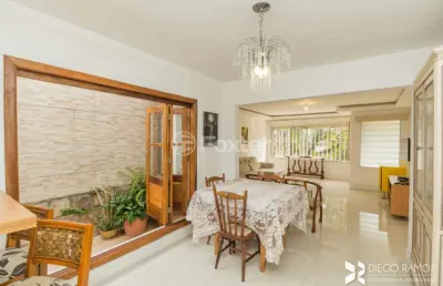 Casa com 3 quartos à venda na avenida general barreto viana, 505, chácara das pedras, porto alegre, 147 m2 por r$ 1.100.000