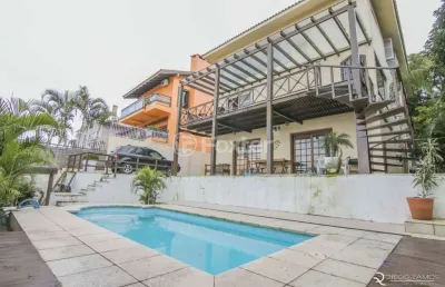 Casa com 4 quartos à venda na rua chiriguano, 265, vila assunção, porto alegre, 394 m2 por r$ 1.490.000