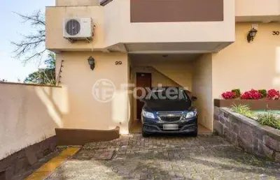 Casa em condomínio fechado com 3 quartos à venda na avenida wenceslau escobar, 3714, sétimo céu, porto alegre, 151 m2 por r$ 520.000