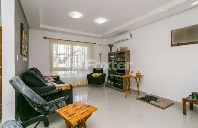 Casa em condomínio fechado com 3 quartos à venda na rua pau-brasil, 263, hípica, porto alegre, 155 m2 por r$ 698.000