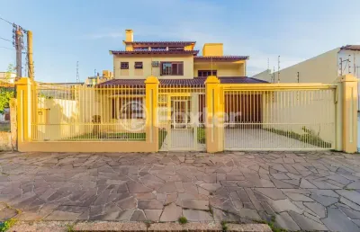 Casa com 4 quartos à venda na rua alfredo silveira dias, 15, nonoai, porto alegre, 350 m2 por r$ 1.100.000