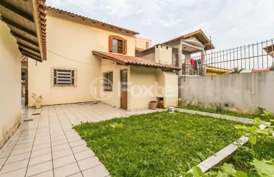 Casa com 3 quartos à venda na avenida doutor saulo coelho, 120, parque santa fé, porto alegre, 120 m2 por r$ 585.000