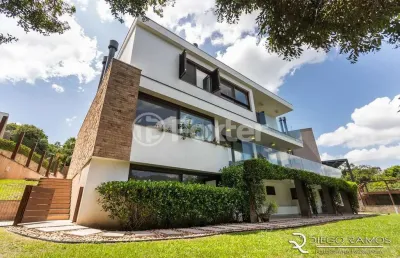 Casa em condomínio fechado com 4 quartos à venda na avenida bento gonçalves, 8083, agronomia, porto alegre, 493 m2 por r$ 4.700.000