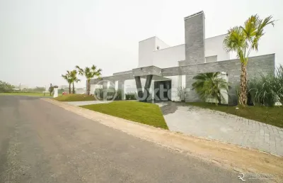 Casa em condomínio fechado com 5 quartos à venda na avenida juca batista, 8000, belém novo, porto alegre, 470 m2 por r$ 4.260.000