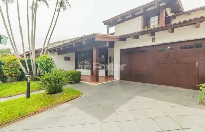 Casa com 5 quartos à venda na rua engenheiro coelho parreira, 384, ipanema, porto alegre, 238 m2 por r$ 1.300.000