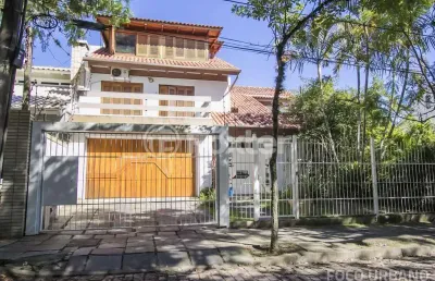 Casa com 3 quartos à venda na rua érico silveira peixoto, 85, ipanema, porto alegre, 226 m2 por r$ 1.200.000