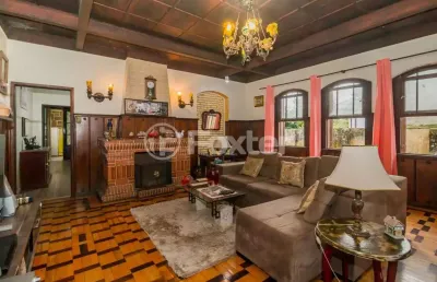 Casa com 3 quartos à venda na avenida heitor vieira, 48, belém novo, porto alegre, 95 m2 por r$ 608.000