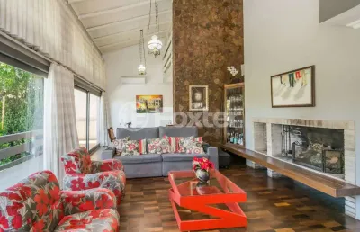 Casa com 3 quartos à venda na rua gustavo schmidt, 20, três figueiras, porto alegre, 313 m2 por r$ 1.950.000