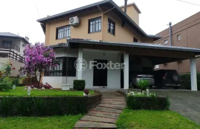 Casa em condomínio fechado com 4 quartos à venda na estrada capitão gentil machado de godoy, 4500, vila elsa, viamão, 380 m2 por r$ 1.300.000