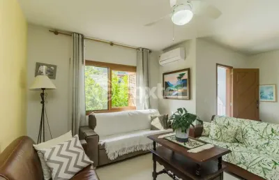 Casa com 4 quartos à venda na rua joão corrêa almeida, 45, vila nova, porto alegre, 244 m2 por r$ 627.000