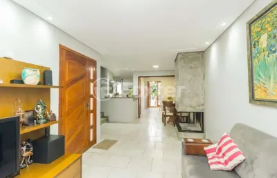 Casa em condomínio fechado com 3 quartos à venda na rua manoel braga gastal, 21, hípica, porto alegre, 142 m2 por r$ 750.000