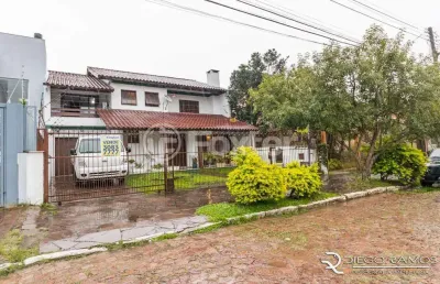 Casa com 4 quartos à venda na rua waldomiro schapke, 311, partenon, porto alegre, 260 m2 por r$ 890.000