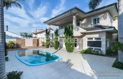 Casa com 4 quartos à venda na rua lagoa do peixe, 170, sarandi, porto alegre, 384 m2 por r$ 2.490.000