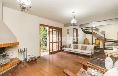 Casa com 3 quartos à venda na rua doutor armando barbedo, 133, tristeza, porto alegre, 220 m2 por r$ 1.094.400