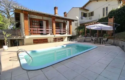Casa com 3 quartos à venda na rua dos minuanos, 285, espírito santo, porto alegre, 291 m2 por r$ 1.100.000
