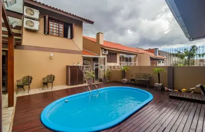 Casa com 4 quartos à venda na rua ari peixoto martins, 190, espírito santo, porto alegre, 258 m2 por r$ 780.000