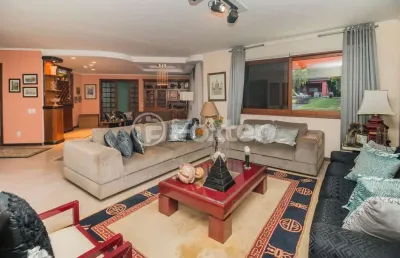 Casa em condomínio fechado com 4 quartos à venda na avenida firmino octávio bimbi, 255, cavalhada, porto alegre, 486 m2 por r$ 2.232.500