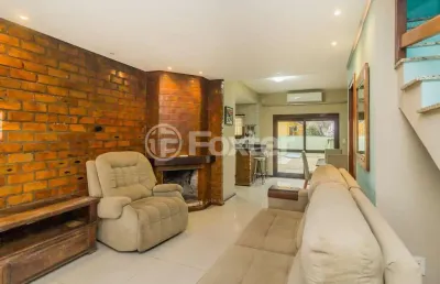 Casa em condomínio fechado com 3 quartos à venda na rua louro, 34, hípica, porto alegre, 174 m2 por r$ 750.000