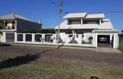 Casa com 3 quartos à venda na rua das petúnias, 3723, capão novo, capão da canoa, 290 m2 por r$ 807.500