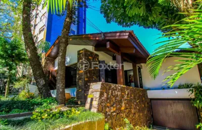 Casa com 3 quartos à venda na rua cônego viana, 215, rio branco, porto alegre, 368 m2 por r$ 2.802.500