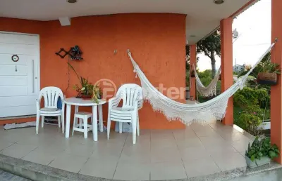 Casa em condomínio fechado com 3 quartos à venda na avenida senador salgado filho, 8500, querência, viamão, 342 m2 por r$ 1.150.000