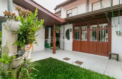 Casa em condomínio fechado com 3 quartos à venda na avenida eduardo prado, 695, cavalhada, porto alegre, 169 m2 por r$ 730.000