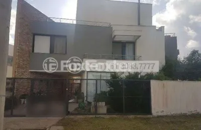 Casa em condomínio fechado com 3 quartos à venda na rua eroni soares machado, 300, hípica, porto alegre, 240 m2 por r$ 950.000
