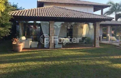 Casa com 4 quartos à venda na rua emboá, 1476, atlântida, xangri-lá, 420 m2 por r$ 1.700.000