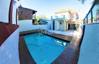 Casa em condomínio fechado com 4 quartos à venda na rua professor antônio josé remião, 15, espírito santo, porto alegre, 297 m2 por r$ 890.000
