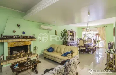 Casa com 4 quartos à venda na rua menezes paredes, 208, nonoai, porto alegre, 262 m2 por r$ 1.330.000