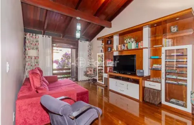 Casa com 4 quartos à venda na rua xavier da cunha, 687, nonoai, porto alegre, 260 m2 por r$ 636.000
