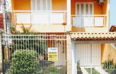 Casa com 3 quartos à venda na rua tesourinha, 174, jardim algarve, alvorada, 220 m2 por r$ 371.000