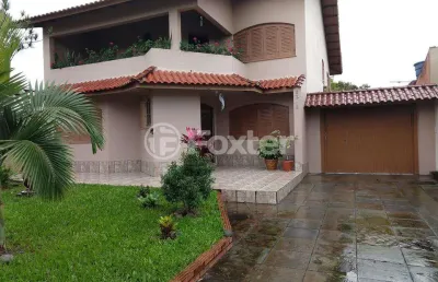 Casa com 4 quartos à venda na rua tamoio, 2292, niterói, canoas, 270 m2 por r$ 940.000